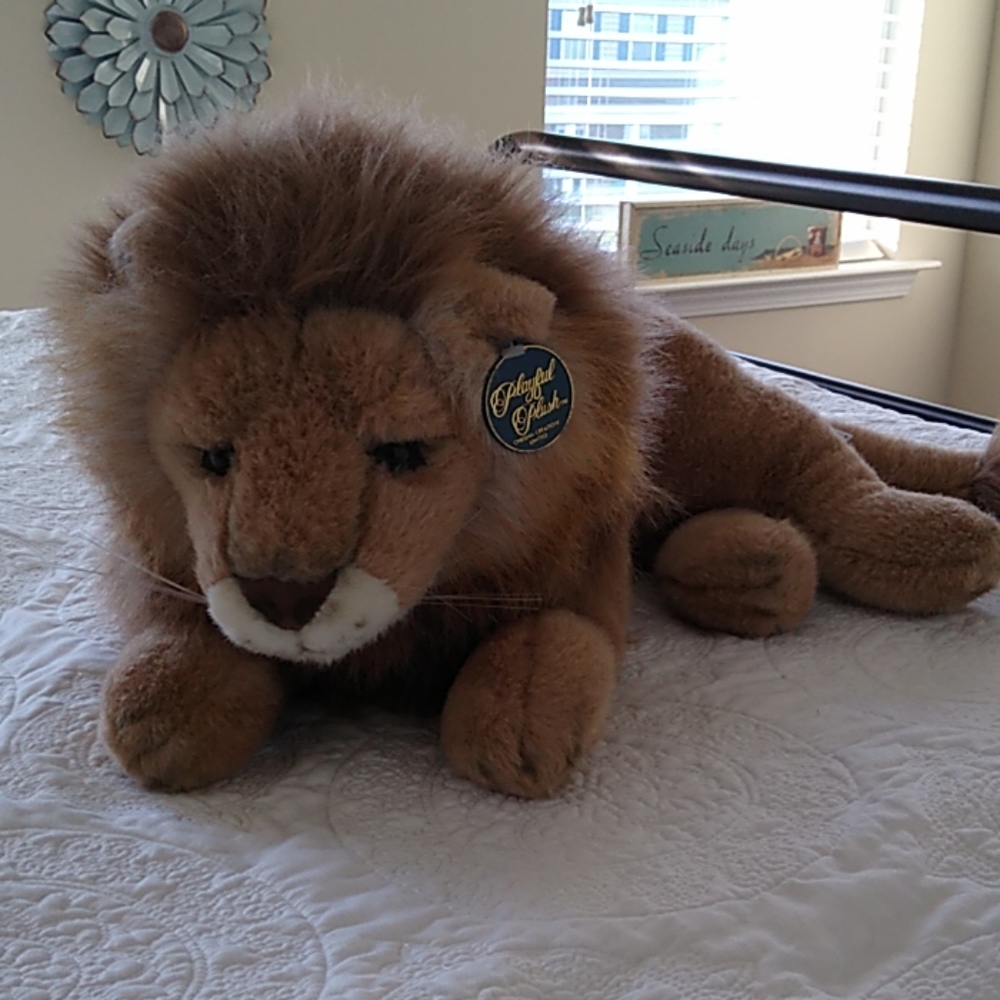 Playful plush Stuffed lion